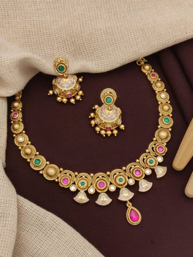 Women Gold-Plated American Diamond-Studded Necklace & Earrings Set