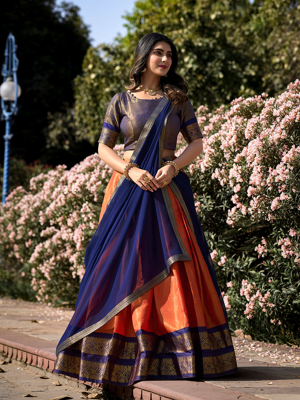 orange-color-kanchipuram-zari-weaving-work-lehenga-choliu-by-looknbook-art.jpg