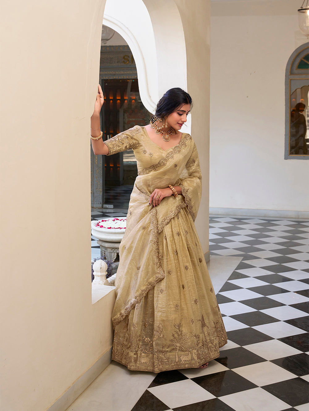 traditional-wear-sequins-and-thread-embroidery-work-gold-crush-lehenga-choli-by-looknbook-art.jpg